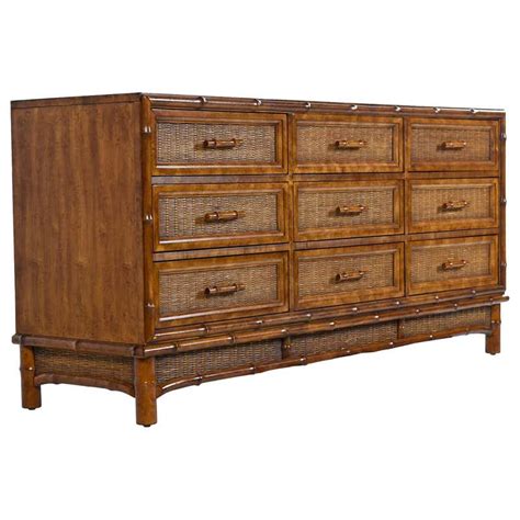 Constructed of solid hardwood and maple veneers. . Used tommy bahama furniture
